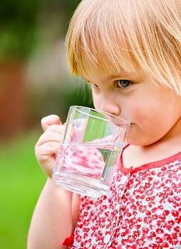 Girl drinking glass of water
